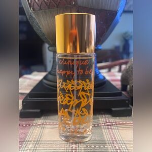 Clinique Happy To Be Fragrance with Orange and Gold Accents